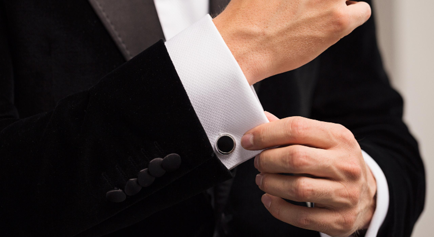 A man wearing a set of Montblanc cufflinks.